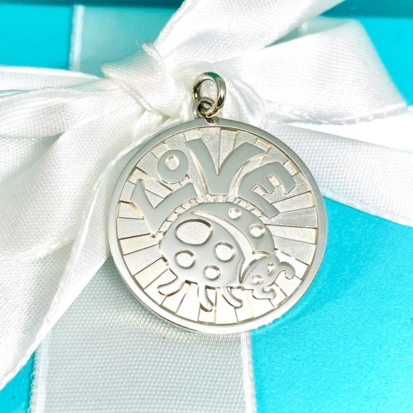 Tiffany and Company love bug round coin  charm with pouch and box NEW - Picture 1 of 6